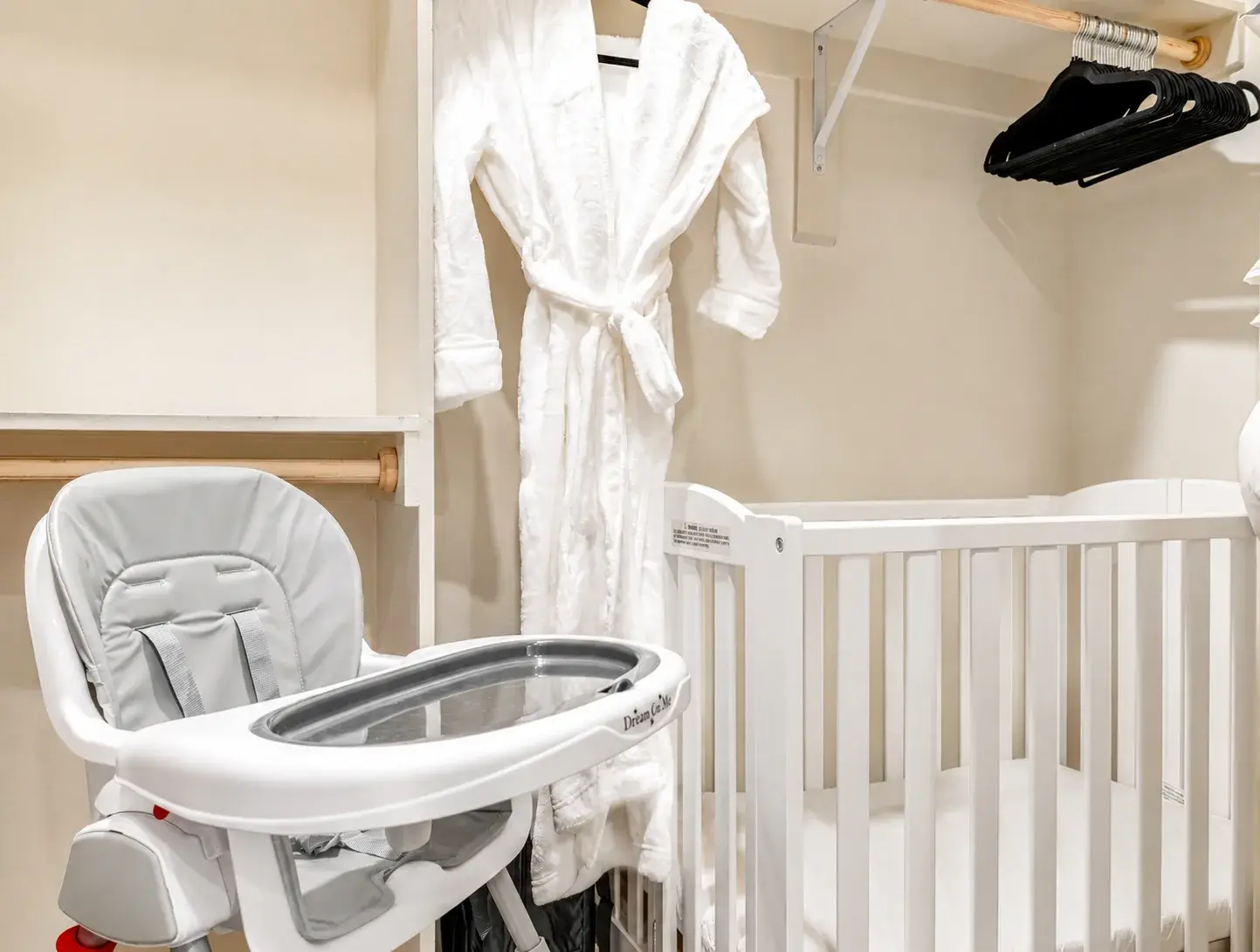 Family-friendly setup with crib, high chair, and thoughtful guest amenities