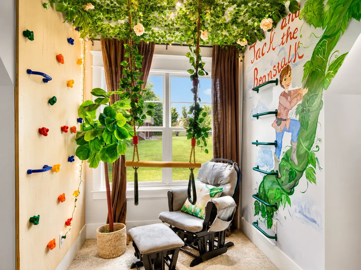 Whimsical kids’ nook with climbing wall, monkey bars, and garden views