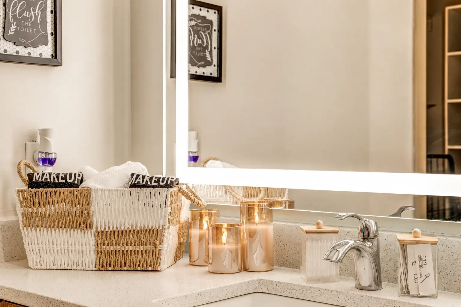 Spa-inspired bathroom vanity with stylish storage and warm touches