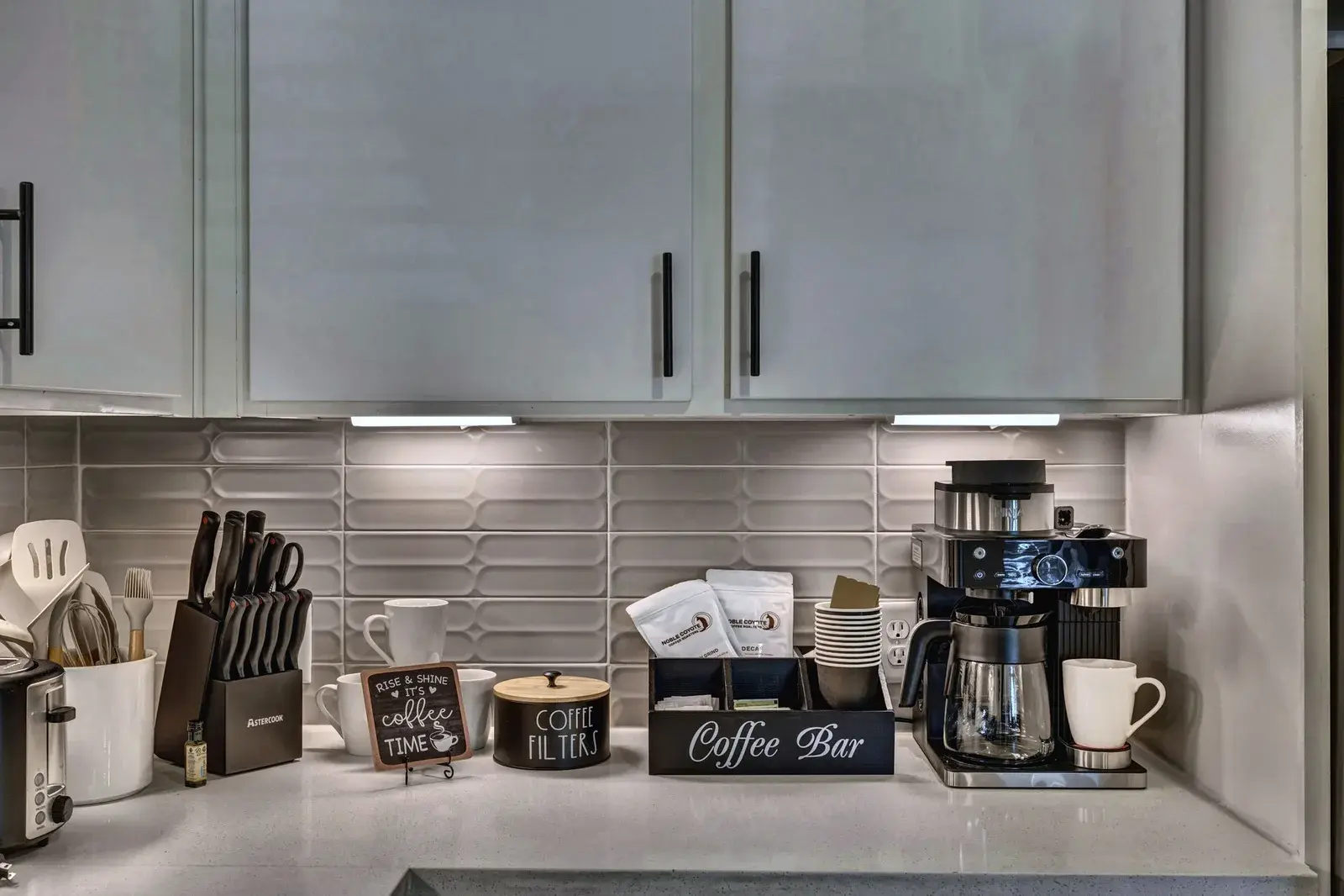 Bright modern kitchen with a cozy, fully stocked coffee bar