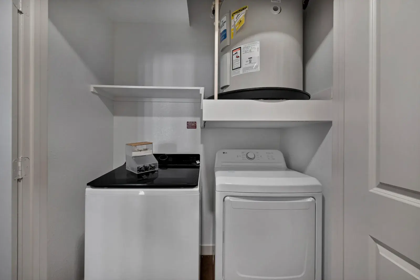 Washer and dryer with shelves