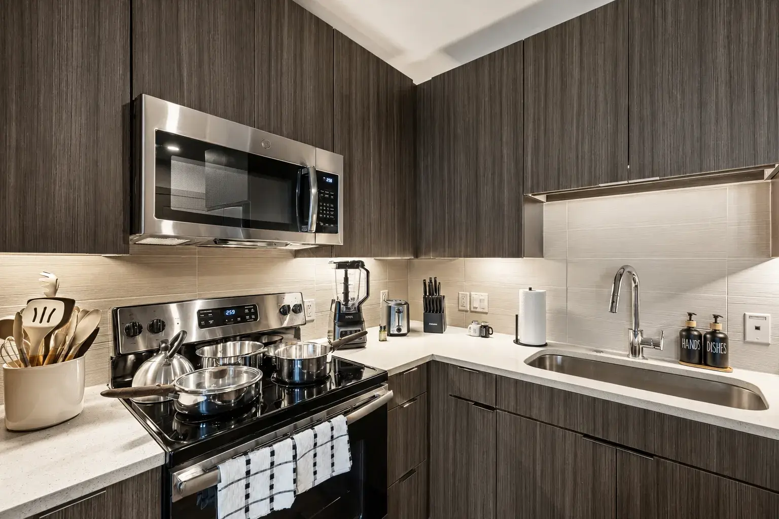 Modern, fully equipped kitchen with stainless steel appliances
