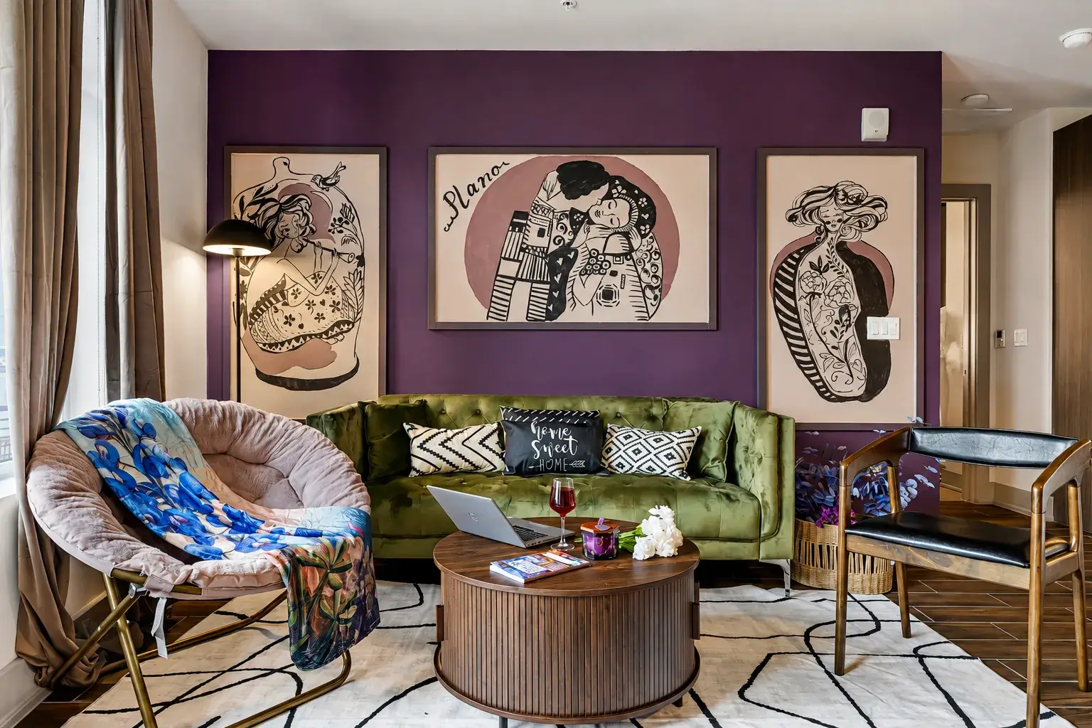 Bold, art-filled lounge with velvet seating and chic modern style