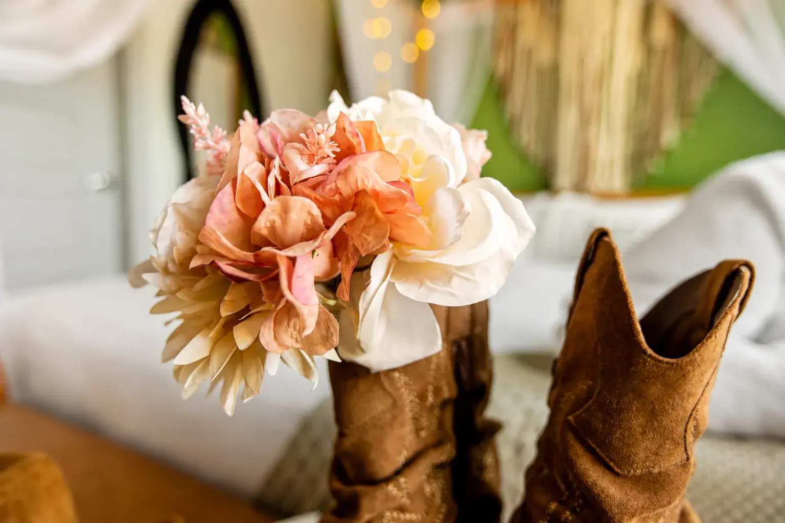 Rustic floral decor and cozy bedroom details with warm boutique charm