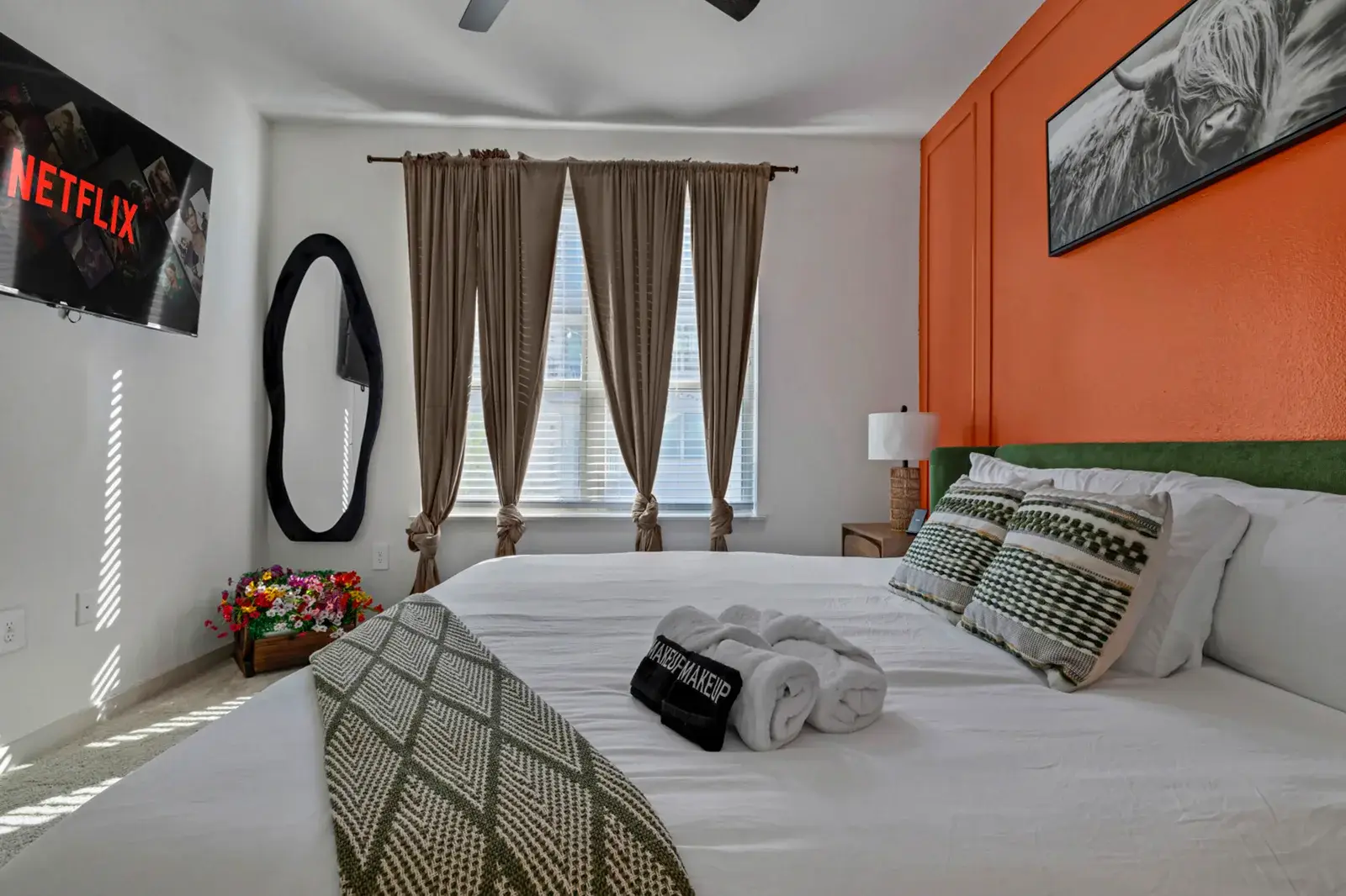King bedroom with a TV