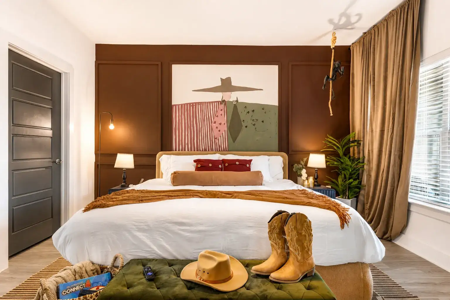 Cozy designer bedroom with warm tones and western-inspired charm