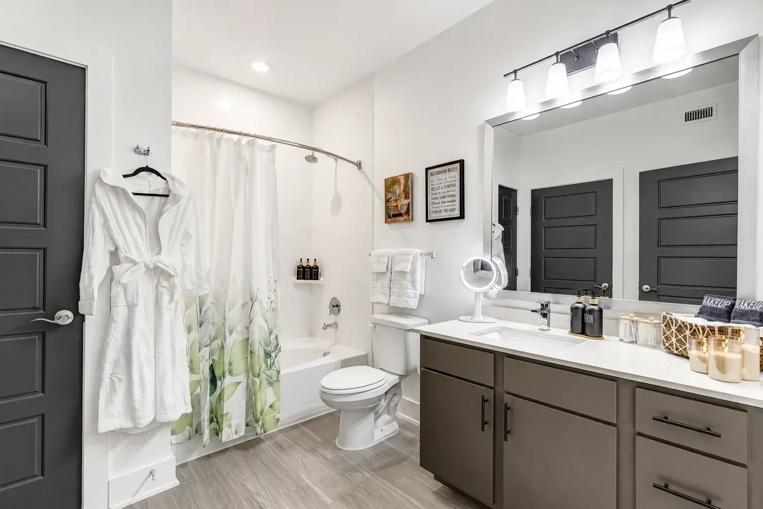 Bright modern bathroom with tub, spacious vanity, and spa-like touches