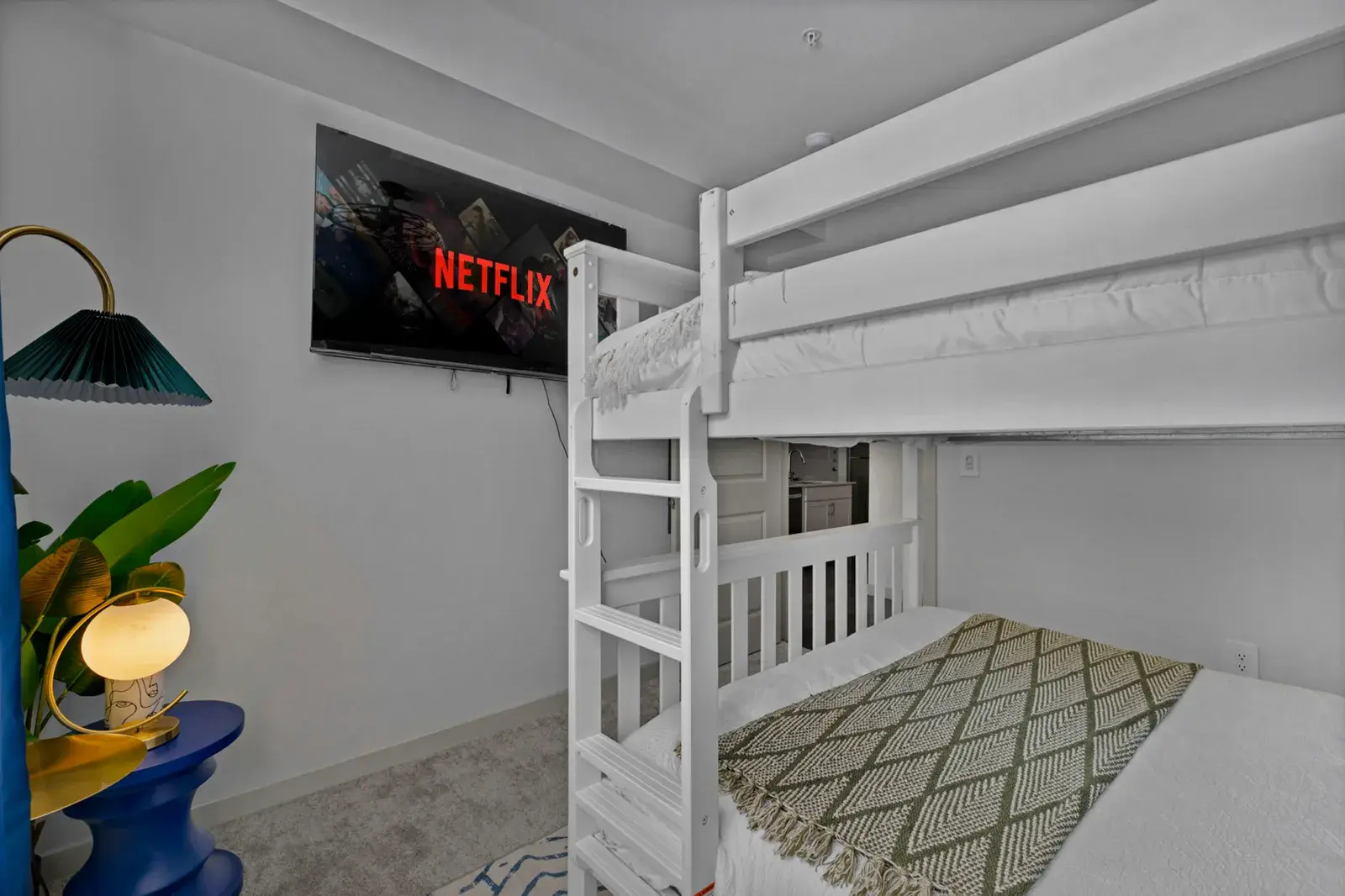Bunk room with a TV