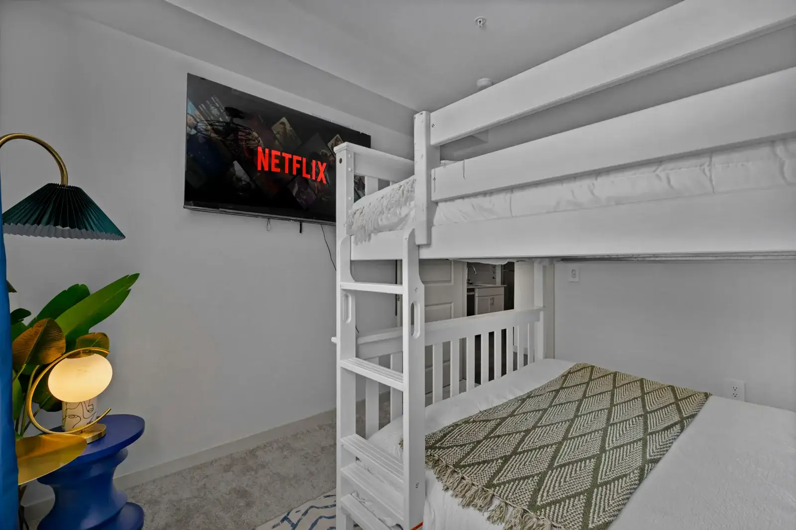 Bunk room with a TV