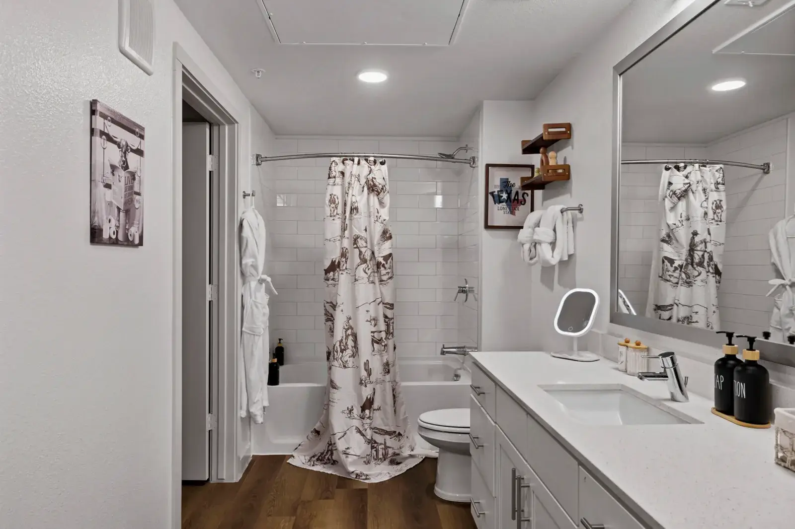 Bathroom with a tub and shower