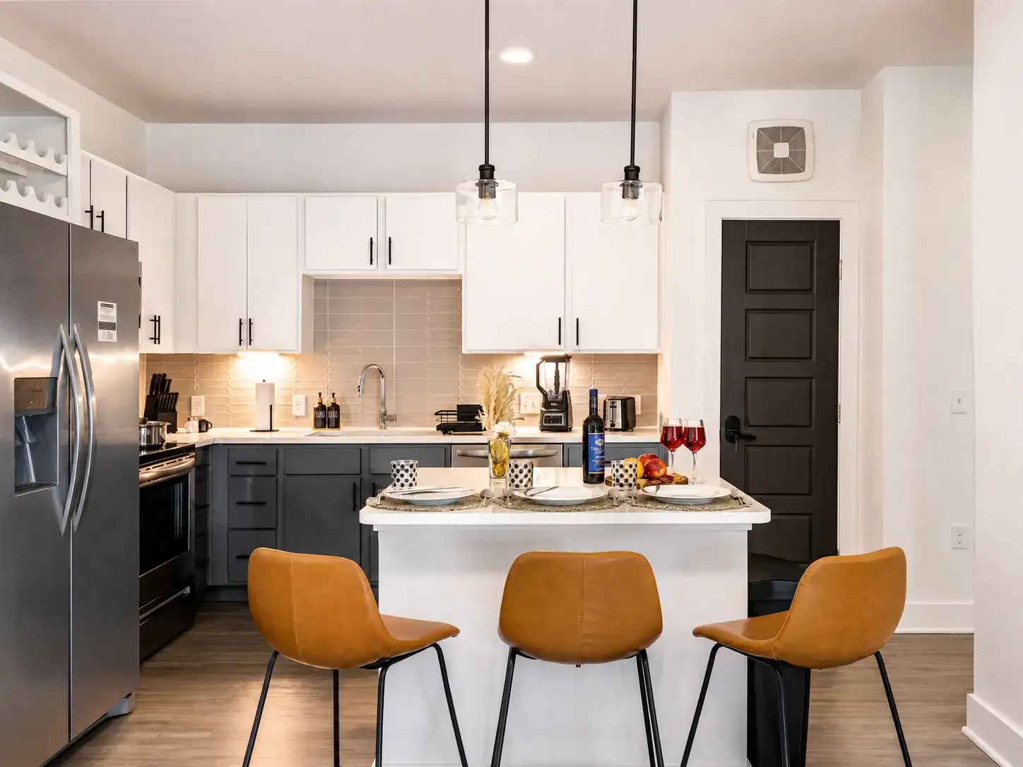 Bright modern kitchen with island seating and stylish finishes