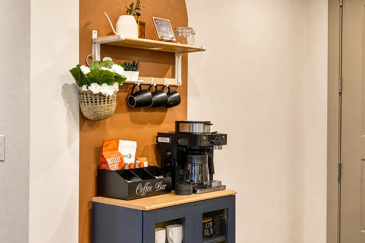 Cozy in-room coffee bar with stocked supplies and stylish decor