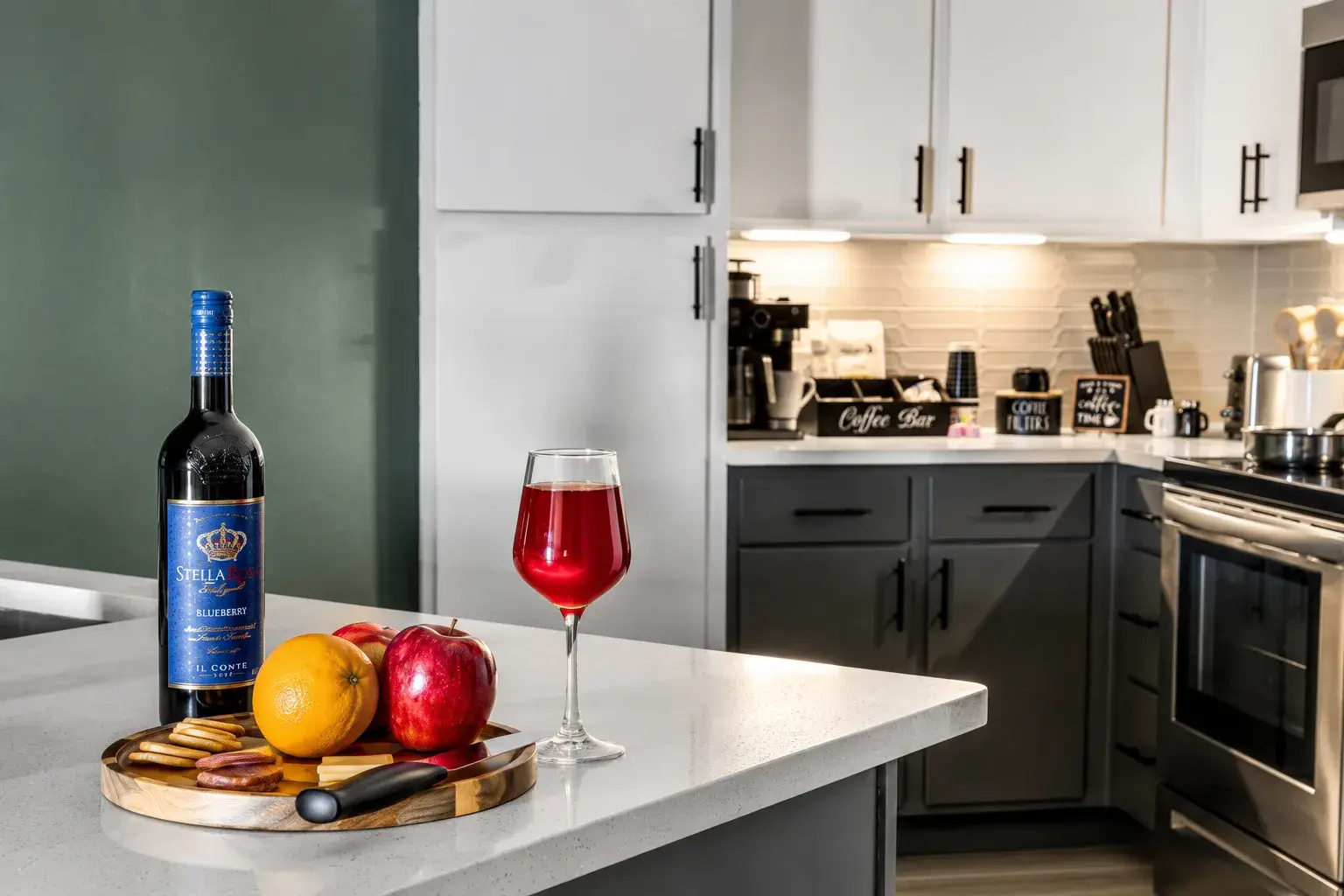 Modern kitchen with wine-ready island, coffee bar, and sleek finishes